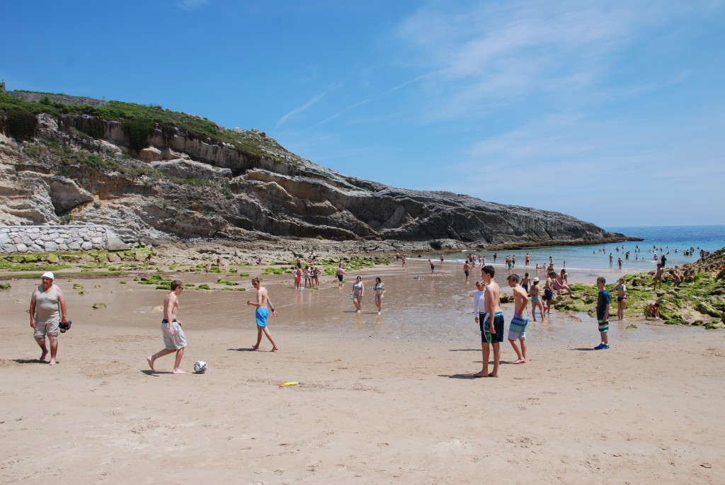 No beach day is complete without a soccer game!